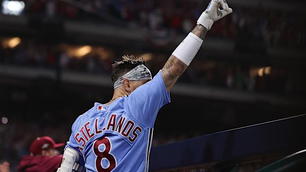 Oct 12, 2023; Philadelphia, Pennsylvania, USA; Philadelphia Phillies right fielder Nick Castellanos (8) celebrates after hitting a solo home run against the Atlanta Braves during the sixth inning during game four of the NLDS for the 2023 MLB playoffs at Citizens Bank Park. Mandatory Credit: Bill Streicher-USA TODAY Sports  